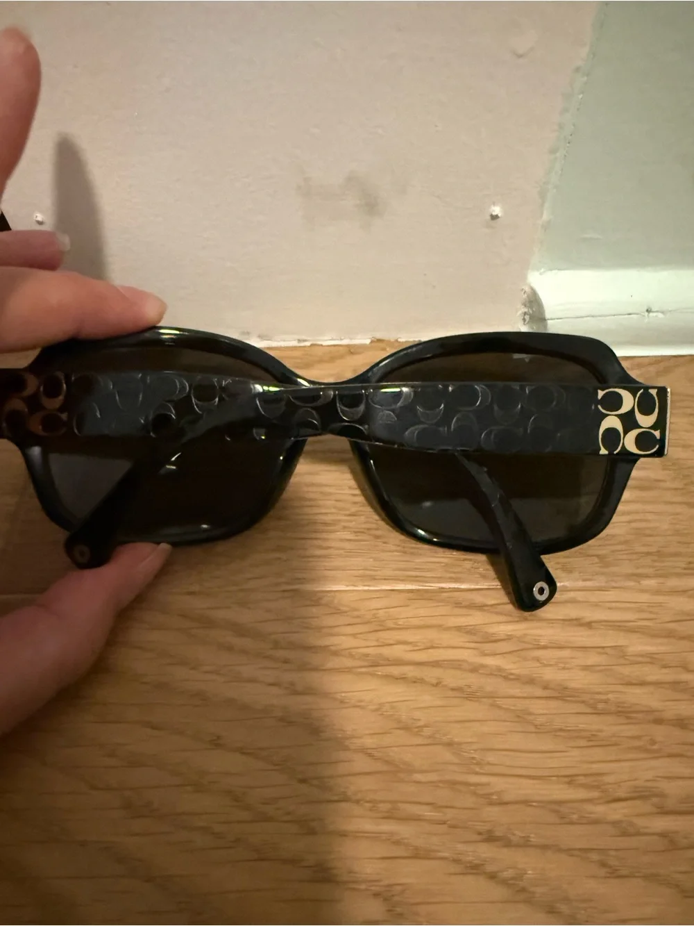 Coach “Emma” Black Logo-Accent Sunglasses with Gold and Pink Details